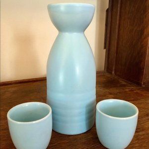 Saki bottle with two cups